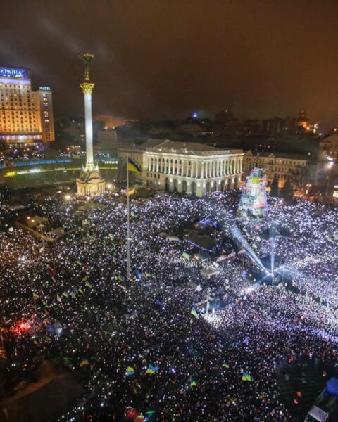 Pro European integration supporters take part in New Year celebrations in Independence Square in central Kiev